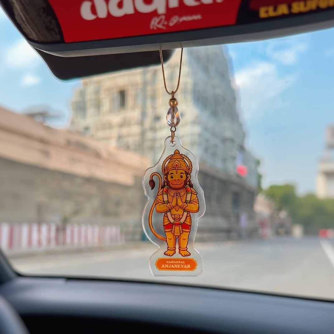 Car hanging with a monkey god illustration on a blurred city street background